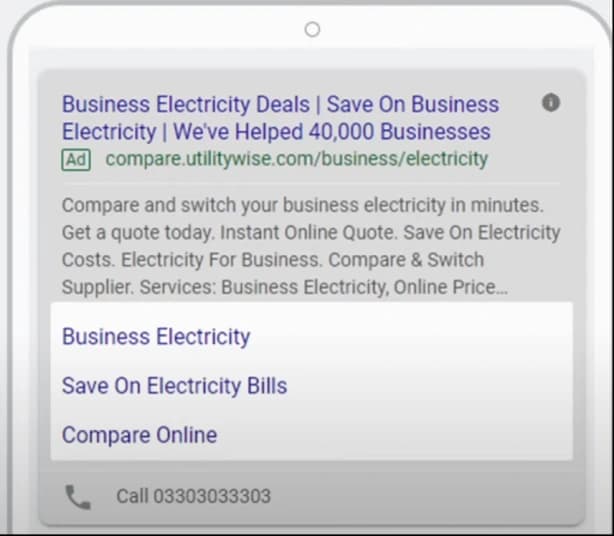 Sitelink extensies voorbeeld in een Google advertentie